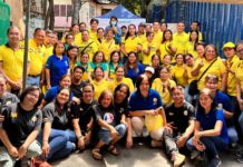 Bringing 26 Rays of Hope: Suntrust’s Anniversary CSR Initiative Shines Bright in Sta. Ana Manila Suntrustees gamely posed with residents and officials of Brgy 886 in Sta Ana, Manila.