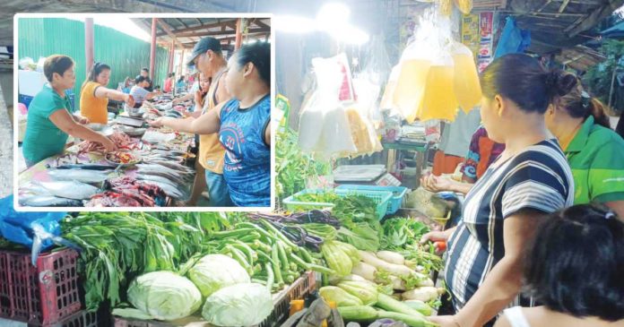 agri-fishery The Department of Agriculture Region 6 advises consumers to opt for budget-friendly vegetables and fishery products for Christmas and New Year celebrations. Photo shows a vegetable stall in Barangay Tigum, Pavia, Iloilo. AJ PALCULLO/PN