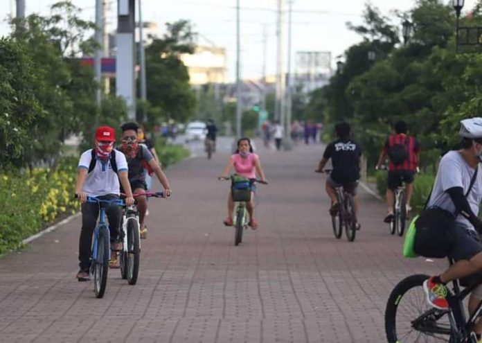 bikers_pic_resized Around 3,000 bike enthusiasts from around the country are expected to converge in Iloilo City for the National Bike Day Awards and Recognition from Nov. 24 to 26. Photo shows bikers traversing one of the city’s bike lanes. ILOILO CITY GOVERNMENT PHOTO