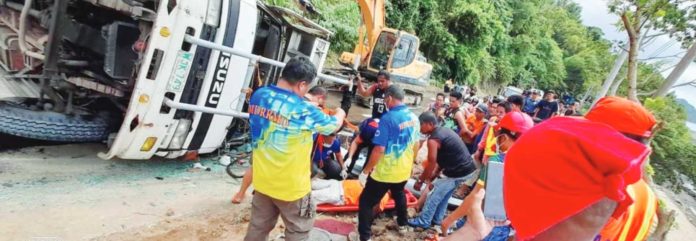 delivery_truck Personnel of the Tobias Fornier Fire Station and Municipal Disaster Risk Reduction and Management Office and the town’s police officers respond to a vehicular accident involving a delivery truck in Barangay Igdalaguit on Tuesday, Nov. 21. TOBIAS FORNIER FIRE STATION PHOTO