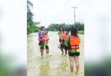 Residents of Sitio Mait, Barangay Sto. Angel in Dumalag, Capiz were evacuated due to flooding. Office of Civil Defense 6 data showed 18,494 families or 61,705 individuals were displaced in Capiz. MDRRMO DUMALAG PHOTO