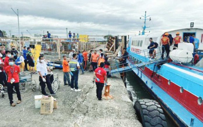 M/V Weesam Express 6, with 172 passengers and 19 crew members, arrives at Bredco port in Bacolod City after its rescue in Guimaras Strait on Tuesday afternoon, Nov. 21. COAST GUARD STATION-NORTHERN NEGROS OCCIDENTAL PHOTO