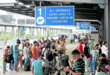 Amid holiday rush, no change to fuel surcharge in December For Level 7, airline passengers will pay a fuel surcharge of P219 to P739 for domestic flights and P722.71 to P5,373.69 for international flights. Photo shows passengers lining up at the departure area of Ninoy Aquino International Airport. INQUIRER FILE PHOTO