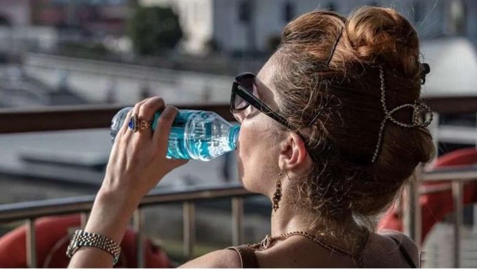 global.JPG_resized A woman drinks water in Istanbul as it bakes in 40C heat in July of this year. GETTY IMAGES