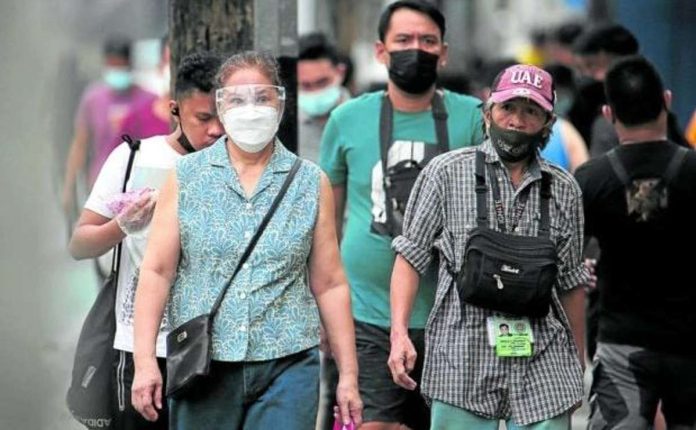 The Department of Health reminds the public to use layers of protection — such as masking or isolating — when sick to prevent respiratory infections from further increasing. File photo by NIÑO JESUS ORBETA / Philippine Daily Inquirer