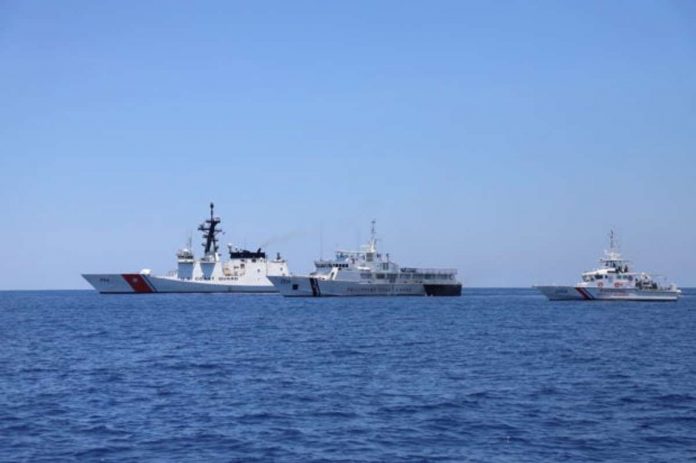 maritime_resized Philippine Coast Guard ships BRP Batangas and BRP Kalanggaman (center and right) sail with the USCGC Bertholf (left) on May 14, 2019, some 50 nautical miles from Subic Bay. PHOTO FROM THE PHILIPPINE COAST GUARD