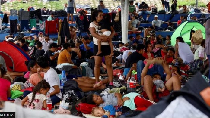 mexico_resized Migrants traveling in a caravan rest before continuing their journey through Mexico in an attempt to reach the USborder, in Huixtla, Mexico. REUTERS