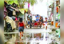 Children play near the breakwater at the BASECO Compound in Tondo, Manila. JONATHAN CELLONA/ABS-CBN NEWS FILE PHOTO