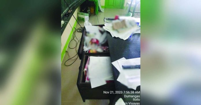 school 1_superimposed Unidentified burglars ransack 15 classrooms at the Dacutan Elementary School in Dumangas, Iloilo on Tuesday, Nov. 21, by breaking the barrel bolts and padlocks. DUMANGAS MUNICIPAL POLICE STATION PHOTOS