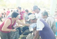 Which places in Iloilo are the most elderly-friendly? Senior citizen residents of a barangay in Concepcion, Iloilo receive clothes during a gift-giving activity. RAUL BANIAS FILE PHOTO