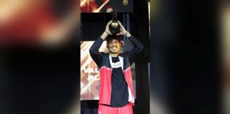 June Mar Fajardo of San Miguel Beermen raises his seventh PBA MVP trophy. PBA PHOTO