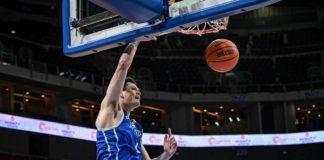 Ateneo de Manila University Blue Eagles' Kai Ballungay goes for a one-handed dunk. UAAP PHOTO