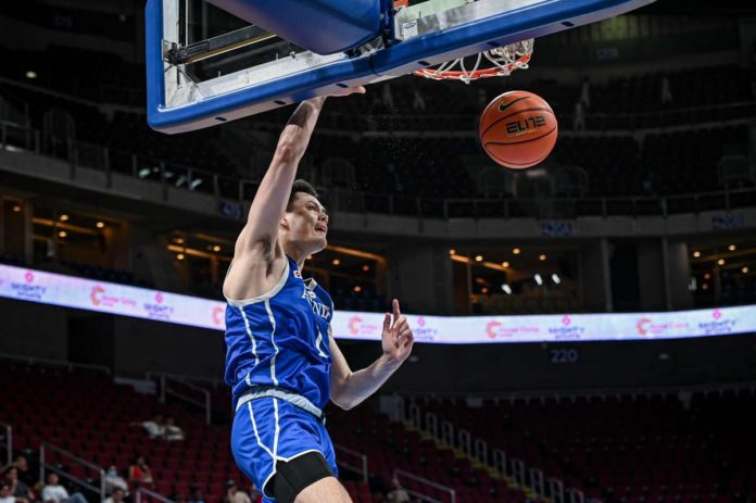 sports_Ateneo_resized Ateneo de Manila University Blue Eagles' Kai Ballungay goes for a one-handed dunk. UAAP PHOTO