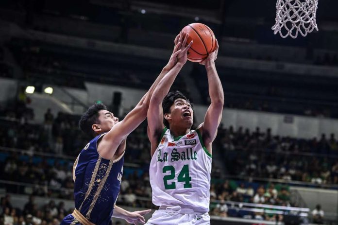 sports_DLSU_resized Negrense Mark Nonoy of De La Salle University Green Archers was fouled by a National University Bulldogs player as he goes for a basket. UAAP PHOTO