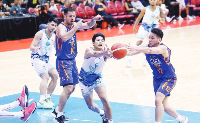 sports_PBA_resized Phoenix Super LPG Fuel Masters’ Ricci Rivero and NLEX Road Warriors’ Matt Nieto fight for the loose ball. PBA PHOTO