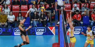 Guimarasnon Jovelyn Gonzaga of Cignal HD Spikers attempts to score against the defense of F2 Logistics Cargo Movers. PVL PHOTO
