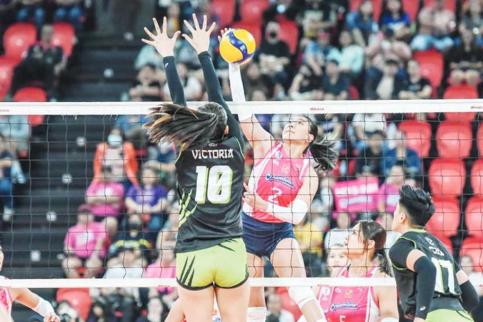 sports_creamline_resized Creamline Cool Smashers’ Alyssa Valdez scores against the defense of Nxled Chameleons’ Camille Victoria. PVL PHOTO