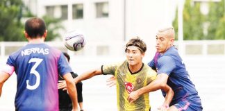 Kaya Futbol Club-Iloilo’s Daizo Horikoshi was held by a Stallion-Laguna FC player. PHOTO COURTESY OF KAYA-ILOILO