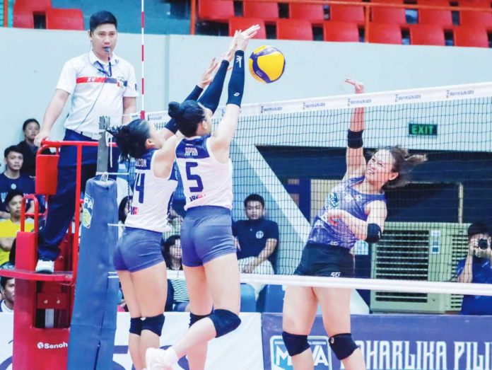 sports_negros_resized Ilongga Shannen Palec of Marikina Lady Shoemasters had her shot blocked by the defense of Negros ICC Blue Hawks. MPVA PHOTO