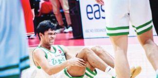 Negrense Mark Nonoy of De La Salle University Green Archers grimaces in pain after a hard fall during their game against University of the East Red Warriors. UAAP PHOTO