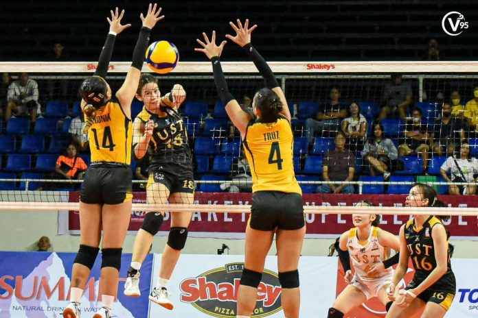 sports_super_resized University of Santo Tomas Golden Tigresses’ Regina Jurado smashes the ball towards the defense of Negrense Kiesha Bedonia of Far Eastern University Lady Tamaraws. PHOTO COURTESY OF THE VARSITARIAN