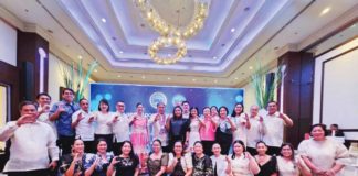 Cadiz City officials and department heads led by Mayor Salvador Escalante, Jr. present the symbolic check worth P2.3 million as their prize as one of this year's seal of good local governance awardees nationwide. BILIS CADIZ/FACEBOOK