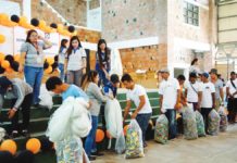 Fisherfolks from Semirara Island wait in queue as they receive their brand-new sets of fishing gear.