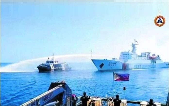 US.JPG_resized National Task Force for the West Philippine Sea said Saturday’s water cannon attack by China Coast Guard (CCG) caused “significant damage” to Datu Bankaw (left). It condemned the CCG’s action as “not as only illegal but also inhumane” for it was directed at a humanitarian mission. SCREEN GRAB FROM PHILIPPINE COAST GUARD VIDEO