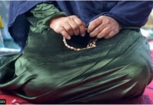 Taliban jails abused women – UN An Afghan woman sits while holding prayer beads. The Taliban's suppression of women's rights in Afghanistan is one of the harshest in the world. GETTY IMAGES