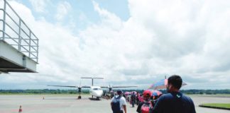 Passengers line up to board an airplane at the tarmac of the Iloilo Airport in Cabatuan town. The airport recorded passenger arrivals of 2,550 and departures of 2,876 in a single day in September this year. PEARL SOCIAS PHOTO