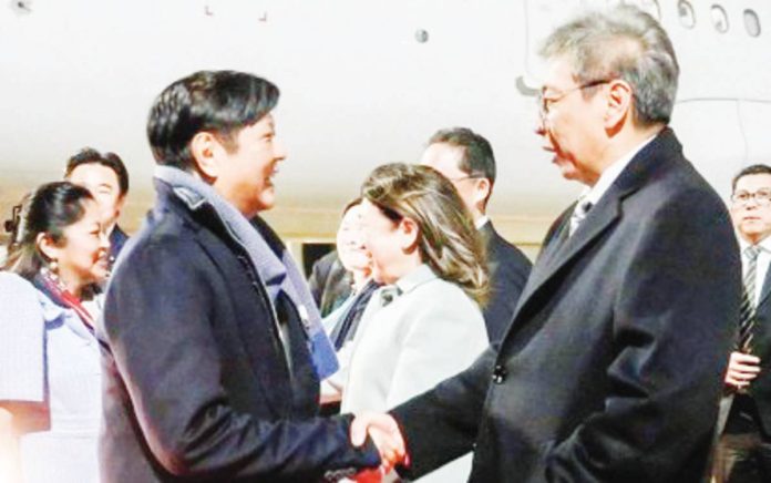 biz_deals_resized President Ferdinand R. Marcos Jr. (left) and party land at Haneda International Airport in Tokyo, Japan on Friday night, Dec. 15. He will participate in the 50th Commemorative ASEAN-Japan Friendship and Cooperation Summit. PHOTO COURTESY OF PCO