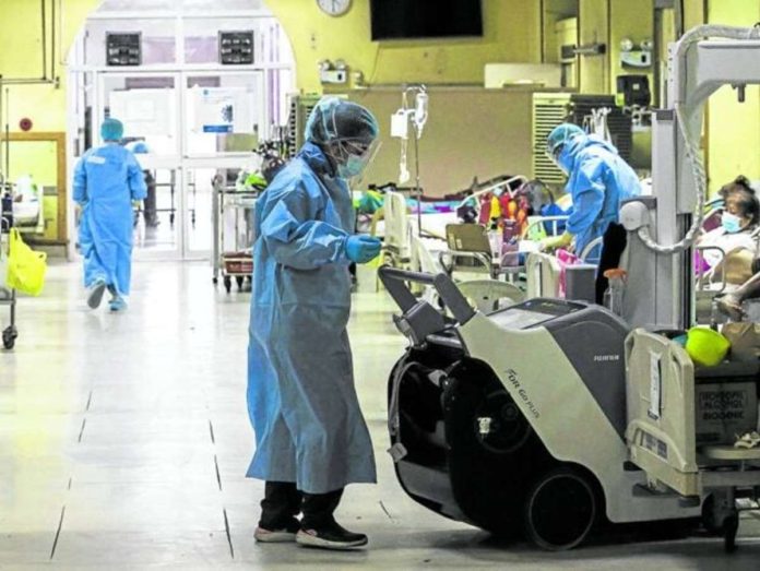 In this photo taken in June 2021, nurses work round the clock at the COVID-19 ward of the Philippine General Hospital in Manila. File photo by RICHARD A. REYES / Philippine Daily Inquirer
