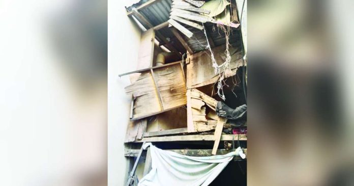 demolished_superimposed The shack owned by siblings Willie and Stephen Oraño, arrested during an antidrug operation on Monday, was demolished by barangay authorities. BARANGAY CAPTAIN JENNIFER QUISTO VIA AKSYON RADYO