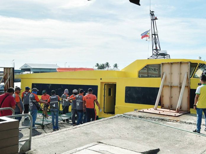 Passengers and crew of M/V City of General Santos were rescued after the vessel’s starboard engine shaft suffered a breakdown near Bredco port in Bacolod City on Thursday, Dec. 7. PHILIPPINE COAST GUARD PHOTO