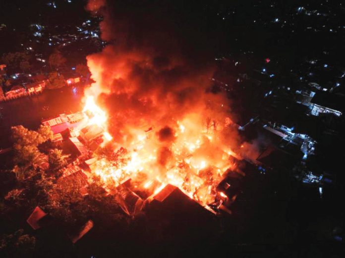 A huge fire razed a residential area in Barangay Salvacion Habog-Habog, Molo, Iloilo City early Saturday morning, Dec. 16.