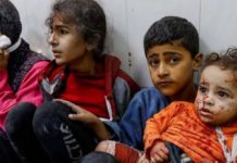 Young children take shelter inside Nasser hospital in Khan Younis, Gaza Strip. REUTERS