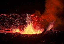 Iceland volcano erupts after quakes A volcano erupts in Iceland. From its vent can be seen magma flowing out. BBC