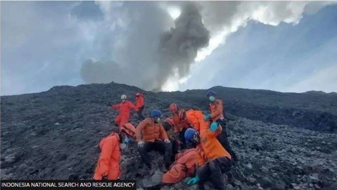 indonesia_resized Rescuers brave an erupting Mount Marapi and the slippery terrain. PHOTO BY THE INDONESIA NATIONAL SEARCH AND RESCUE AGENCY