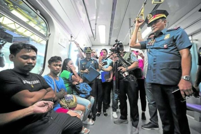 intel_resized Philippine National Police chief Gen. Benjamin Acorda Jr. takes a train ride to Quiapo after inspecting the Araneta-Cubao station of LRT 2 on Tuesday. Security has been increased in Metro Manila after Sunday’s terror attack in Marawi City. GRIG C. MONTEGRANDE, PHILIPPINE DAILY INQUIRER