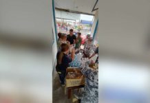 ‘Kabayan’ causes sea travel chaos ahead of holidays Personnel of the Philippine Coast Guard Auxiliary's 618th Squadron serve hot food and drinking water to stranded passengers at the BREDO Port in Bacolod City on Monday afternoon, Dec. 17. PCG-NEGROS OCCIDENTAL PHOTO