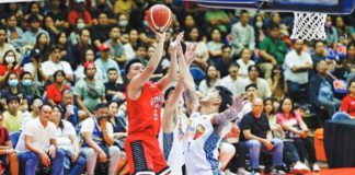 Barangay Ginebra San Miguel Kings’ Earl Scottie Thompson pulls up for a basket against the defense of TNT Tropang Giga’s Glenn Khobuntin. PBA PHOTO