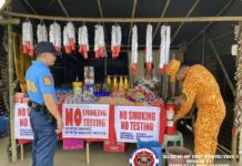 Bureau of Fire Protection personnel in Passi City, Iloilo inspect sellers of firecrackers at the designated area in Barangay Poblacion Ilawod on Thursday, Dec. 28. BFP R6 PASSI CITY FA FB PAGE PHOTO