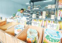 Rice supply stable until next harvest season – DA A worker arranges sacks of rice at a local rice store in Quezon City in this file photo. MARIA TAN, ABS-CBN NEWS/FILE PHOTO