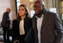 Former Rwanda doctor found guilty of genocide Sosthene Munyemana arrives at court with his lawyer in November. GETTY IMAGES