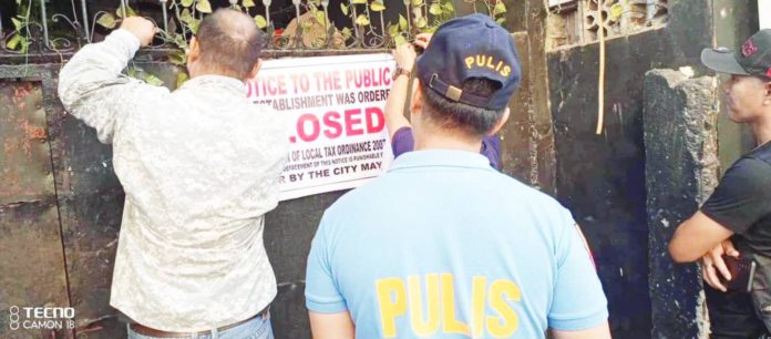 Authorities ordered the closure of an establishment in Barangay Villa Anita, Iloilo City Proper on Wednesday, Dec. 20, for serving liquor to minors. AKSYON RADYO ILOILO/FACEBOOK
