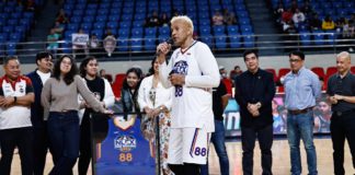 NLEX Road Warriors center Asi Taulava speaks to the crowd during his jersey retirement ceremony last night. PBA PHOTO