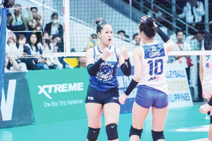 Negrense Sophie Cagalawan of Negros ICC Blue Hawks rejoices after scoring an attack against Bacoor City Strikers Metro Land Builders Corp. MPVA PHOTO