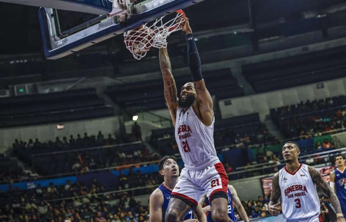 sports_PBA_resized Barangay Ginebra San Miguel Kings import Tony Bishop soars for a two-handed dunk. PBA PHOTO