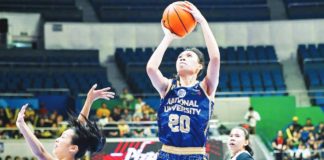 Ilongga Ann Pingol of National University Lady Bulldogs goes for an inside basket. UAAP PHOTO