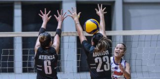 Choco Mucho Flying Titans’ Cherry Ann Rondina smashes the ball to the defense of Ilongga Ma. Shaya Adorador of Chery Tiggo Crossovers. PVL PHOTO